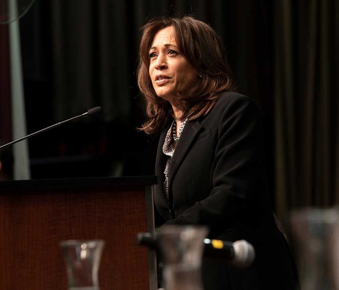 Person speaking at a podium with microphone.