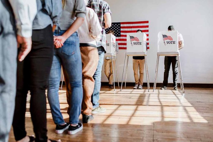 People in line at voting booths.