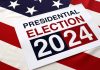 Presidential Election 2024 sign on American flag.