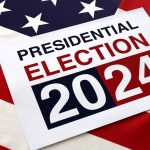 Presidential Election 2024 sign on American flag.