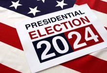 Presidential Election 2024 sign on American flag.