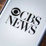 CBS News logo on a smartphone screen.