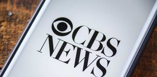 CBS News logo on a smartphone screen.