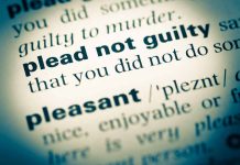 "plead not guilty" definition in a dictionary.