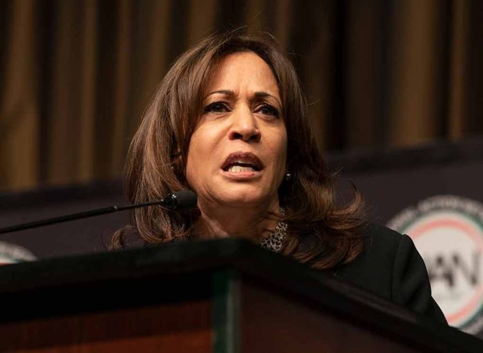 Woman speaking at a podium, serious expression.