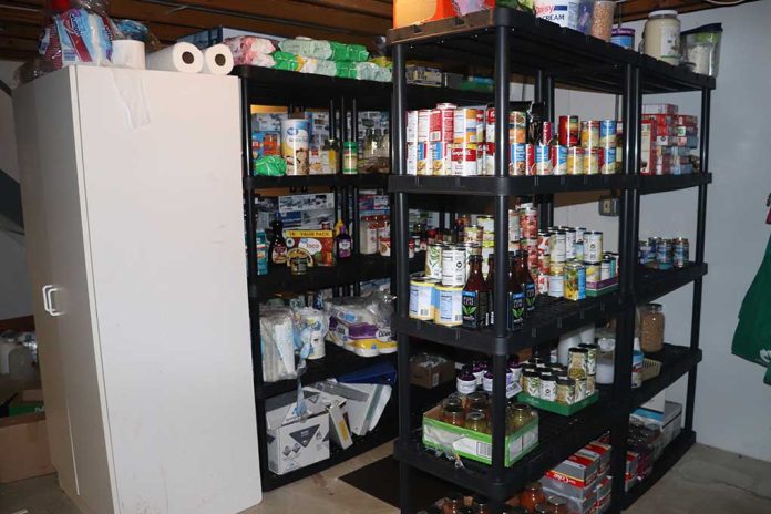 Shelves stocked with canned goods and household supplies.