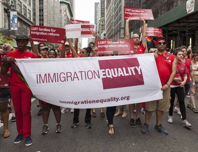 Group holding "IMMIGRATION EQUALITY" banner at a parade.