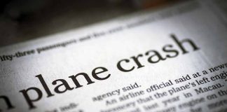 Newspaper headline about a plane crash story