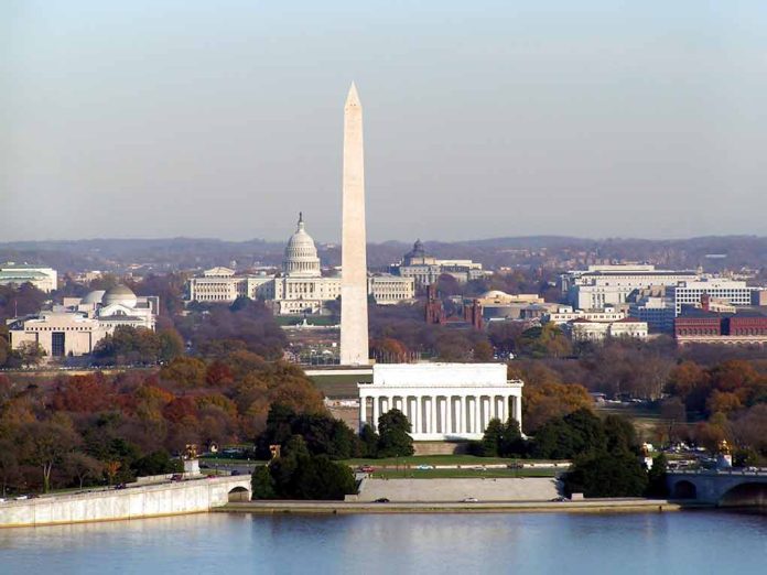 Washington D.C. monuments with autumn foliage.