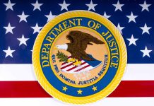 Department of Justice seal on American flag background.