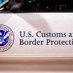 U.S. Customs and Border Protection vehicle logo and text.