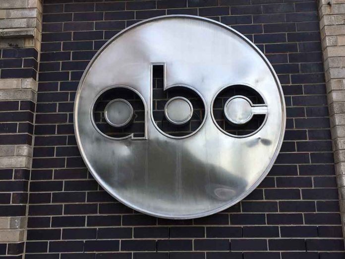 ABC logo on a brick wall.