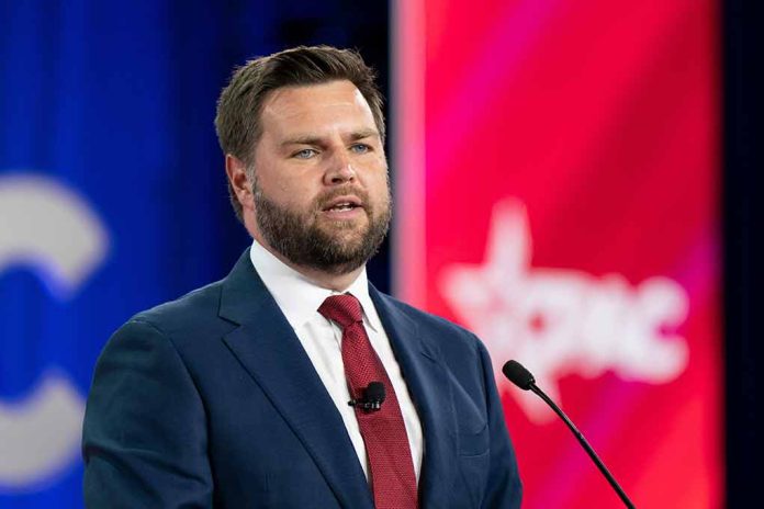 Man in suit speaking at podium with microphone