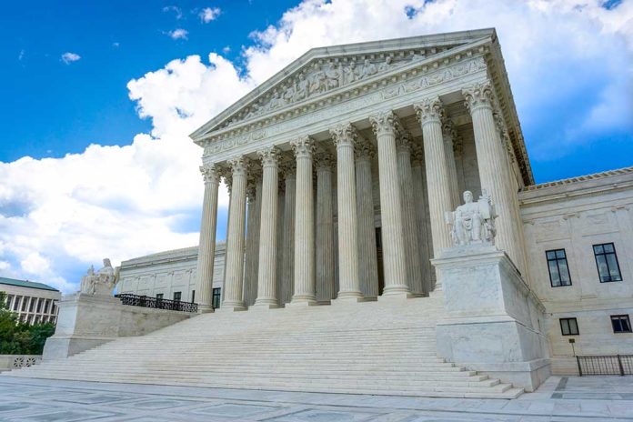 1714955689 featured image White marble building with columns under blue sky