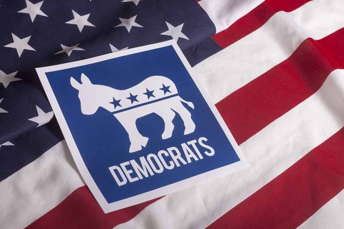 305852246 featured image Democrats sign on American flag background.