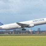 United airplane taking off from a runway.