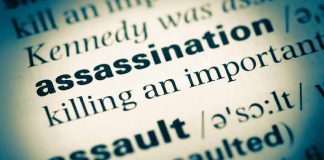 Dictionary page with word assassination highlighted