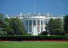 White House with American flag and fountain visible