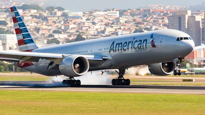 693382546 featured image Airplane landing on runway with cityscape background.