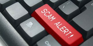 Keyboard with red SCAM ALERT key