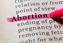 Abortion highlighted in a dictionary with a pink marker