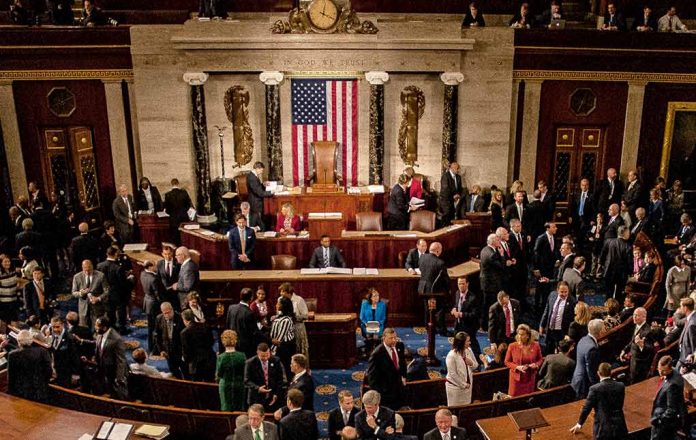 1186368265 featured image People gathering in United States legislative chamber meeting room