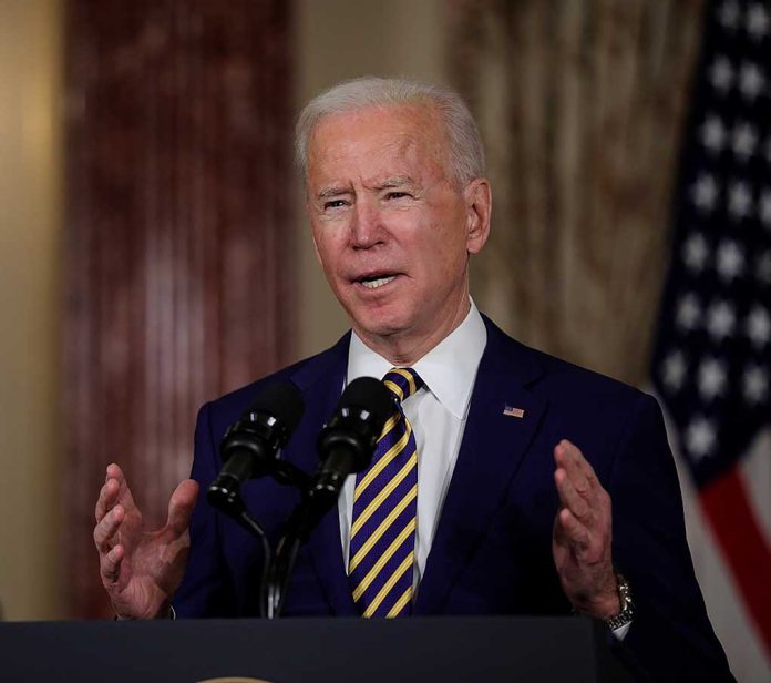 1910141161 featured image Man speaking at a podium with microphones.