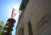 American flag at Department of Justice building exterior