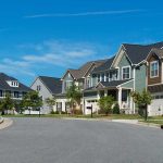 Suburban street with colorful modern houses
