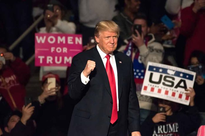 560025514 featured image Man in suit surrounded by supportive crowd holding signs