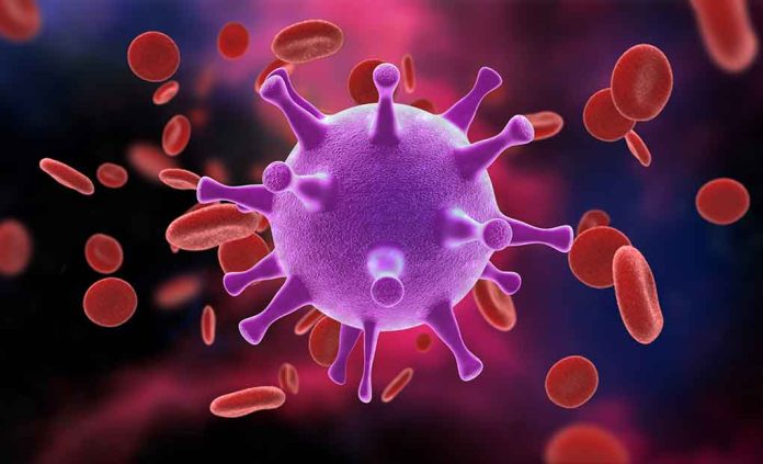 766978168 featured image Virus surrounded by red blood cells.