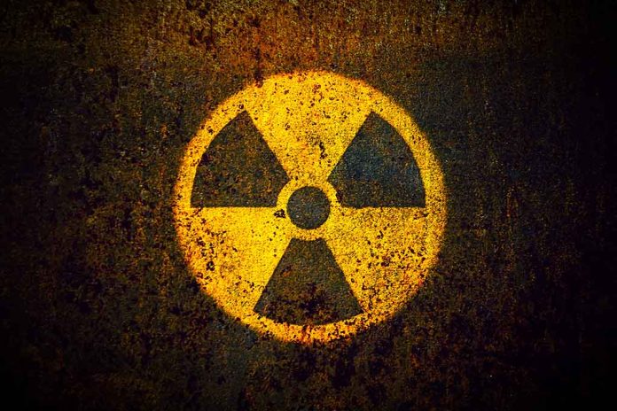 1082372921 featured image Yellow radiation warning symbol on rusty metal surface