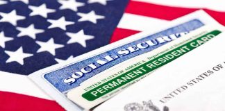 Social Security card and green card on flag