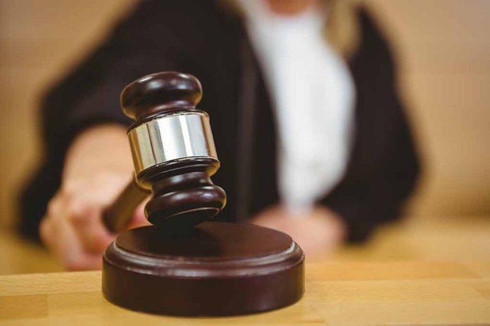 243995698 featured image Judge using a gavel in courtroom