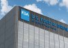 FDA building with blue logo and sky background