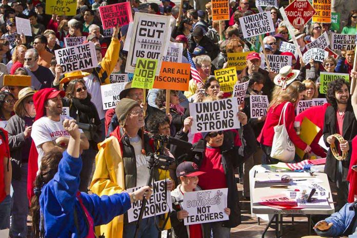 72245182 featured image Protesters holding signs about unions and saving the American dream