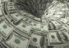Hundred dollar bills swirling into a financial vortex