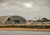 Aircraft hangar with helicopters near the beach