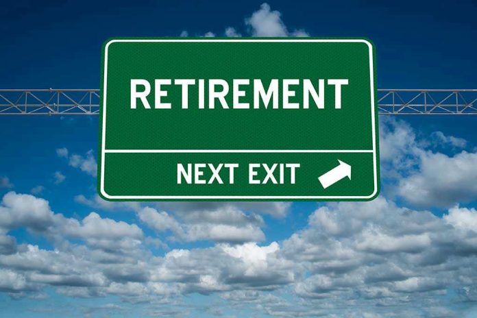 583127620 Green road sign reading retirement next exit sky background
