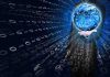 A businessman holding a glowing globe surrounded by binary code