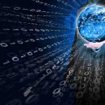 A businessman holding a glowing globe surrounded by binary code