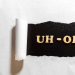 Harris’s $1.5B Blunder STILL Haunts Democrats Torn paper revealing UH-OH text underneath.