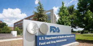 FDA BURIED Deadly Tylenol Warnings for Decades FDA building sign with blue sky background.