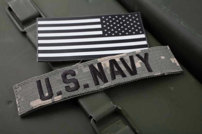 2277330471 U.S. Navy patch with black-and-white American flag.