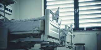 Patient Killed by Roommate – FINALLY BUSTED (again)! Empty hospital beds by a window.