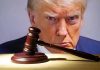 Comey vs. Trump — LATEST Saga in Explosive Legal Battle Gavel in front of a serious mans face.