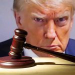 Comey vs. Trump — LATEST Saga in Explosive Legal Battle Gavel in front of a serious mans face.