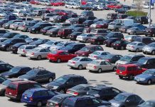 LEAST RELIABE CARS — Shocking 2025 Report A crowded parking lot filled with various cars