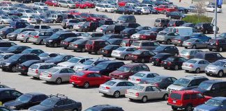 LEAST RELIABE CARS — Shocking 2025 Report A crowded parking lot filled with various cars
