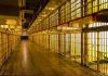 LAST-SECOND Reprieve Stuns Oklahoma — Death Row Shocker Empty hallway between rows of prison cells.
